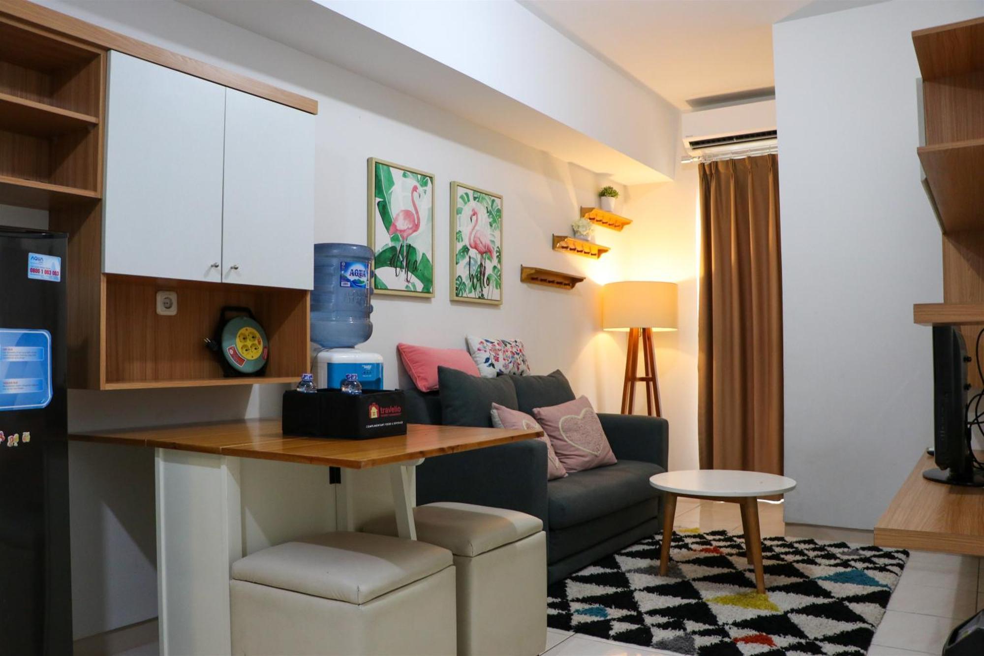 Tranquil Designed And Homey 2br At Springlake Summarecon By Travelio Apartemen *